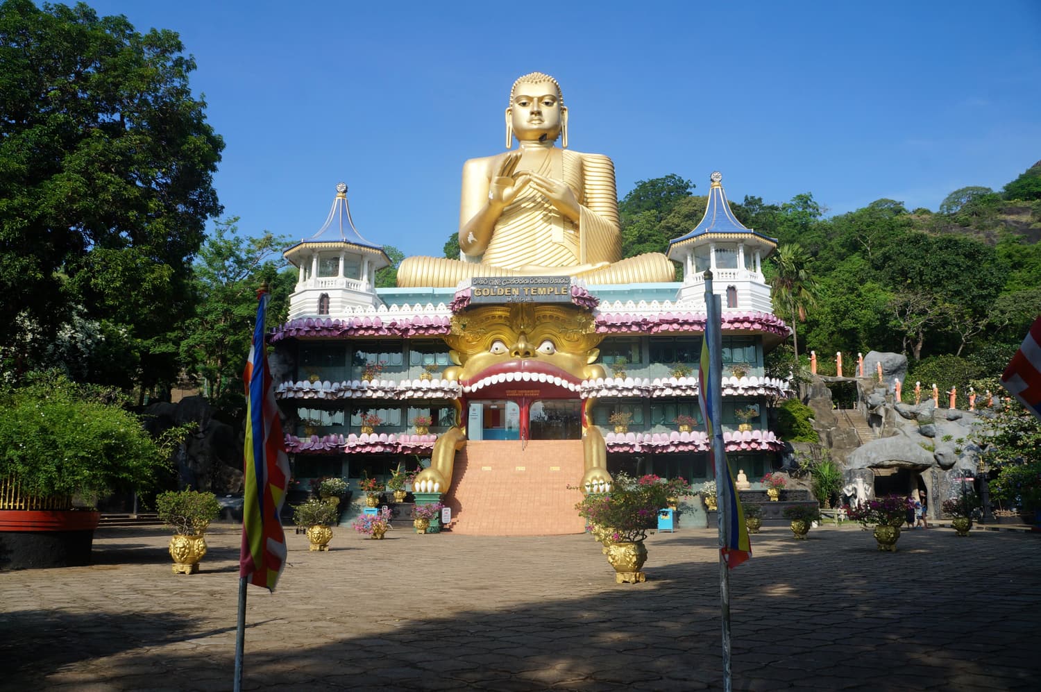 The giant golden Buddha statue on the roof of the Golden Temple museum in Dambulla